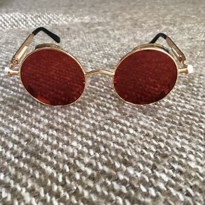 Steampunk gold round sunglasses with red lenses